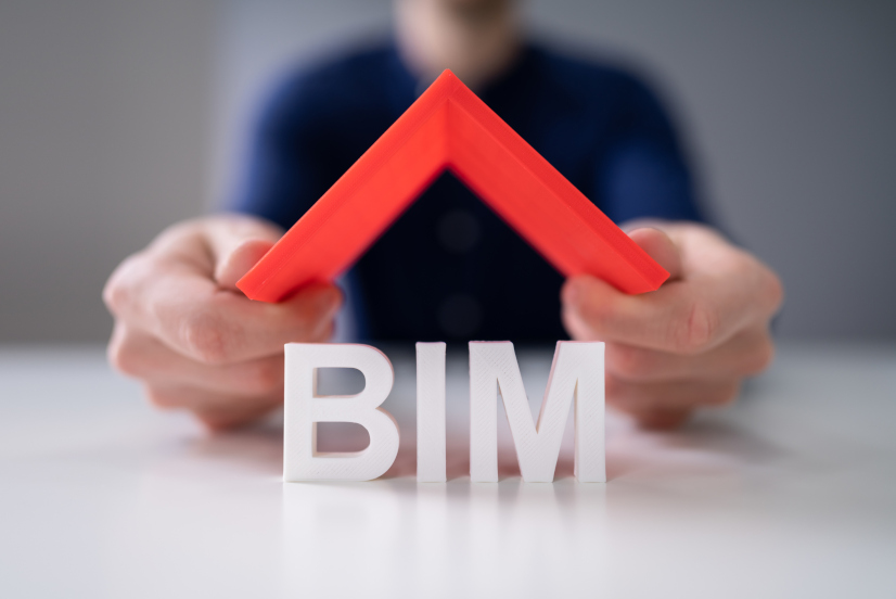 Businessman Holding Roof Over BIM Text On White Desk|33D Modell eines Bauprojekts||PlanRadar BIM Viewer coming soon|