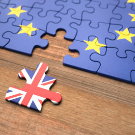 United Kingdom leaving the European Union represented in puzzle pieces.|