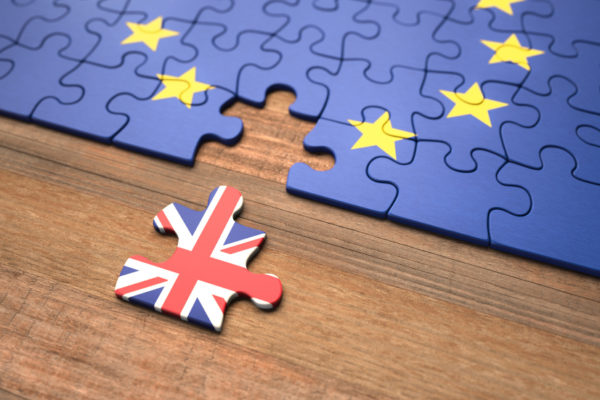 United Kingdom leaving the European Union represented in puzzle pieces.|
