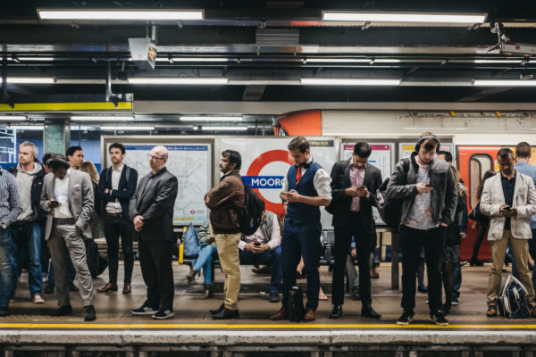 People on a platform of Moorgate station of London Underground