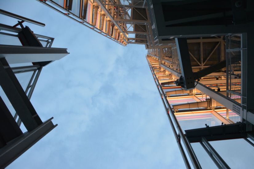 image of a construction site scaffold facing up to the sky